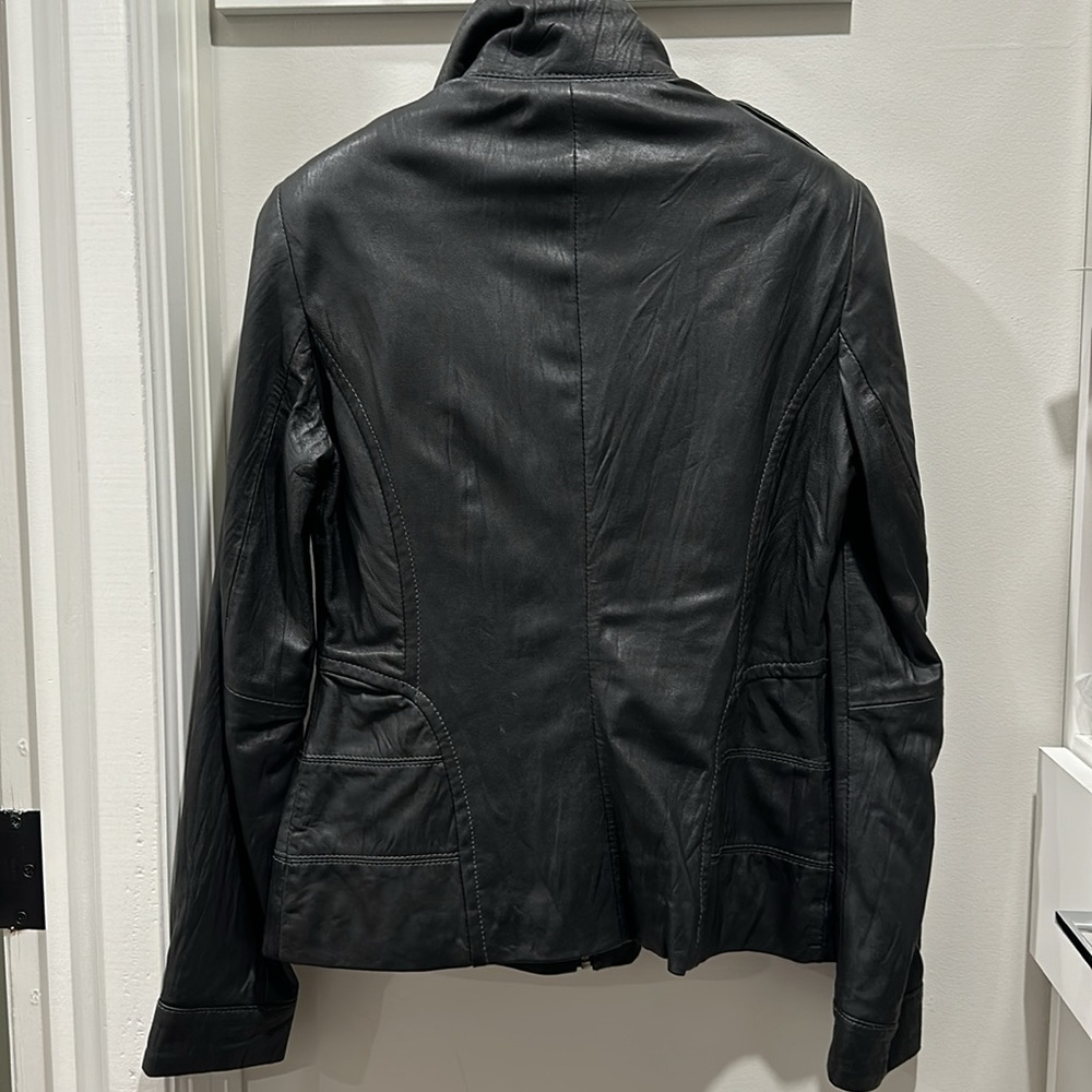 Soft, black leather jacket with zipper and button feature - Picture 7 of 7